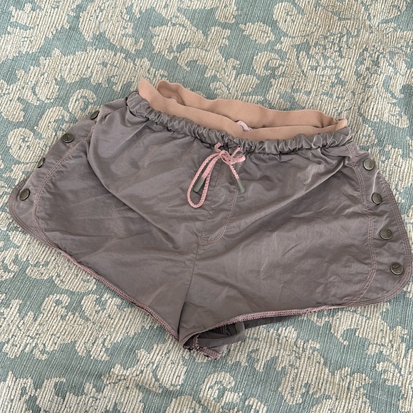 Free People Pants - Free people movement pinkish gray shorts.